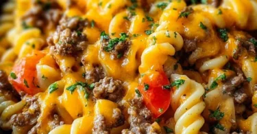 Delicious Cheeseburger Casserole dish garnished with fresh ingredients.