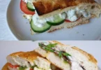 Feta-Fladenbrot frisch aus dem Ofen mit zerbröckeltem Feta und Kräutern