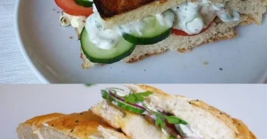 Feta-Fladenbrot frisch aus dem Ofen mit zerbröckeltem Feta und Kräutern