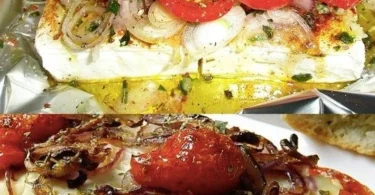 Gegrillter Feta mit Knoblauch und frischen Kräutern auf einem Teller