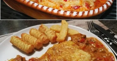 Leckerer Gyros Auflauf mit Paprika und Pilzen auf einem Teller serviert.