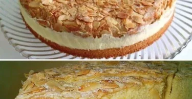 Leckere Mandeltorte mit Mandeln und Sahne dekoriert