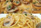 Pasta mit einer cremigen Pilzsauce auf einem Teller serviert