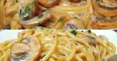 Pasta mit einer cremigen Pilzsauce auf einem Teller serviert