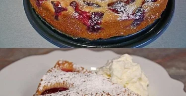 Pflaumenkuchen mit Eierlikör auf einem Teller serviert