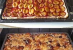 Pflaumenkuchen mit Streusel auf einem Teller, frisch gebacken und serviert.