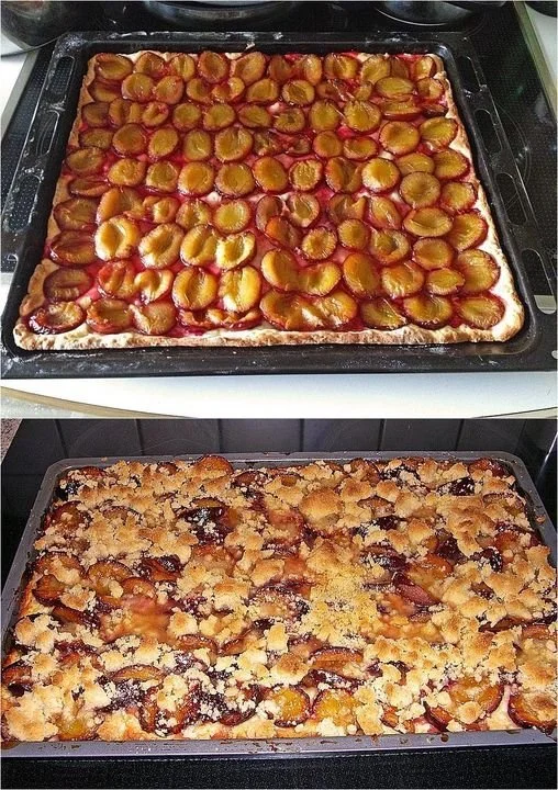 Pflaumenkuchen mit Streusel auf einem Teller, frisch gebacken und serviert.