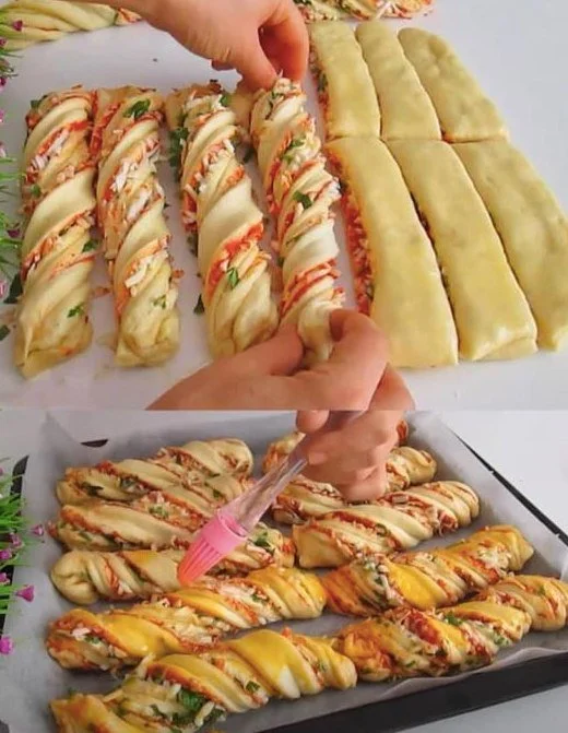 Puff Pastry Sticks mit Schinken und Käse auf einem Teller