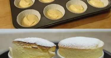 Frisch gebackene Quark-Muffins auf einem rustikalen Holzbrett