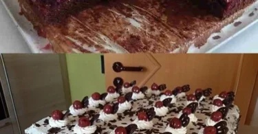 Schwarzwälder Kirschtorte mit Schokolade, Sahne und Kirschen garniert