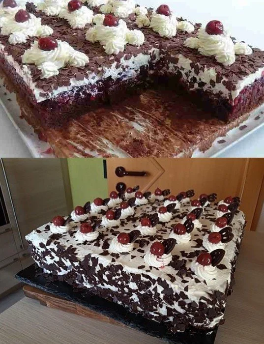 Schwarzwälder Kirschtorte mit Schokolade, Sahne und Kirschen garniert