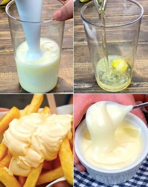 Schüssel mit selbstgemachter Mayonnaise auf Holzuntergrund.