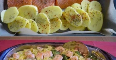 Tagliatelle mit Lachs und Brokkoli auf einem Teller serviert