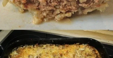 Blumenkohlauflauf mit Hackfleisch und Käse auf einem Teller serviert.