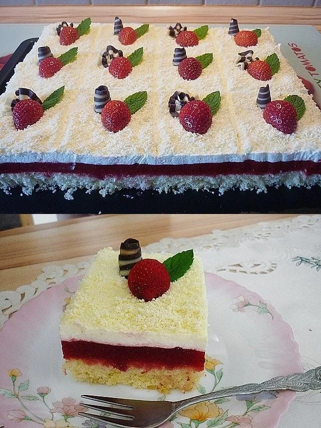Erdbeerkuchen mit Sahne auf einem schönen Teller serviert