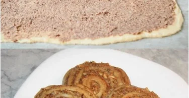 Leckere Großmutters Nussschnecken auf einem Teller, frisch gebacken.