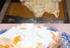 Kuchen mit Mandarinen-Sauerrahm auf einem Teller angerichtet