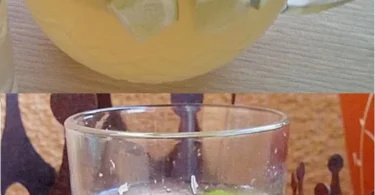 Erfrischende Limonade mit Ingwer-Ale in einem Glas mit frischen Zutaten.