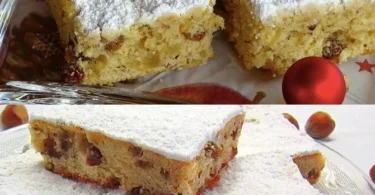 Quarkkuchen mit kandierten Früchten und Marzipan auf einem Teller