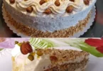 Sahne Nusstorte mit Sahne und Nüssen dekoriert auf einem eleganten Dessertteller.