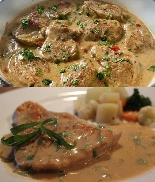 Schnitzel in Sahnesauce auf einem Teller serviert mit Beilagen