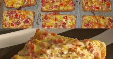 Leckeres Toast mit Schinken und Käse auf einem Teller serviert