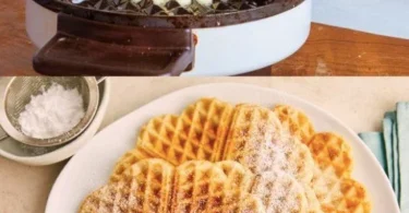 Leckere Waffeln mit frischen Früchten und Sahne garniert.